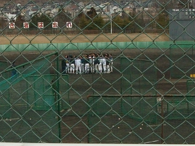 Immediately after the earthquake. Members of the baseball team gathering at the center of the ground